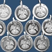 Médaille pélican héraldique en argent
